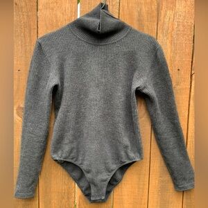 Wolford Merino turtleneck bodysuit in size small.